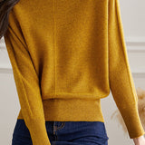 Round-neck sweater with cuffed hem.