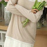 Knitted sweater in fake two-piece style with color-blocking splicing