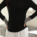 Knitted sweater in fake two-piece style with color-blocking splicing