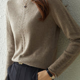 Half turtleneck knitted sweater.