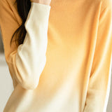 Round-neck gradient knitted sweater.