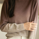 Round-neck gradient knitted sweater.