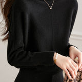 Round-neck sweater with cuffed hem.