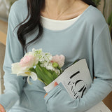 Knitted sweater in fake two-piece style with color-blocking splicing