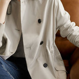 Simple lapel trench coat.