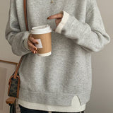 Slit fake two - piece pullover sweater