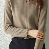 Half turtleneck knitted sweater.