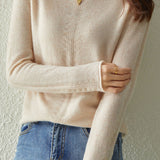 Half turtleneck knitted sweater.