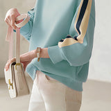 Contrast - color spliced round - neck sweatshirt