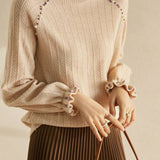 Elegant beaded high - neck knitted sweater