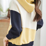 Contrast-color spliced hooded top