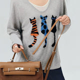 Fake two - piece long - sleeved cat - pattern knitted sweater.