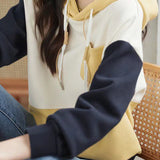 Contrast-color spliced hooded top