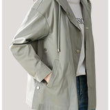 Short hooded trench coat.