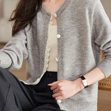 Lace-trimmed short knitted cardigan