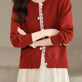 Lace-trimmed short knitted cardigan