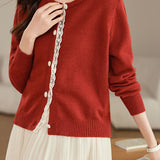 Lace-trimmed short knitted cardigan