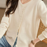 Lace-trimmed short knitted cardigan