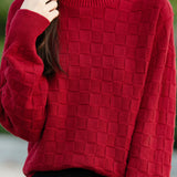 Half turtleneck solid-color sweater with square decorations