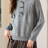 Hooded cable-knit sweater with horn buttons