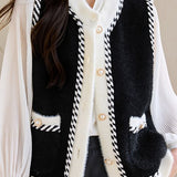 Chanel-style sleeveless knitted vest