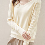 Solid-color V-neck knitted top