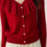 V-neck ruffled solid-color sweater