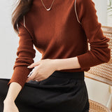 Half-turtleneck knitted sweater