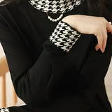 Houndstooth half-turtleneck knitted sweater