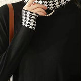 Houndstooth half-turtleneck knitted sweater