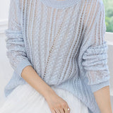 Hollowed-out knitted blouse