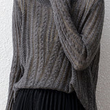 Hollowed-out knitted blouse