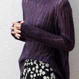 Hollowed-out knitted blouse