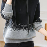 Loose hooded pullover knitted sweater