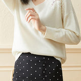 Lace and pearl V-neck sweater