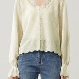 Lace-spliced V-neck knitted sweater