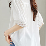 Cut-out embroidered solid-color shirt