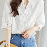 Cut-out embroidered solid-color shirt