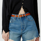 High - waisted denim shorts with frayed edges