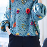 Batwing-sleeved three-dimensional jacquard sweater