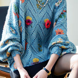 Batwing-sleeved three-dimensional jacquard sweater