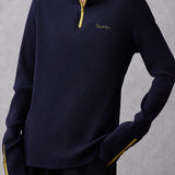 Half - zipper hooded knitted sweatshirt.