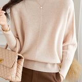 Round-neck sweater with cuffed hem.