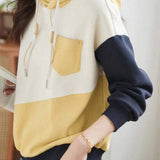 Contrast-color spliced hooded top