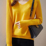 Solid-color V-neck knitted top