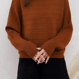 Batwing-sleeved striped knitted top