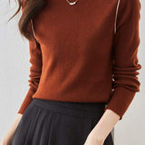 Half-turtleneck knitted sweater