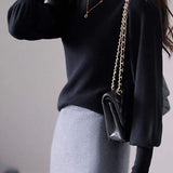 Solid color lantern sleeve knitted sweater