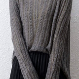 Hollowed-out knitted blouse