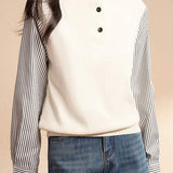 Striped spliced high-neck knitted sweater